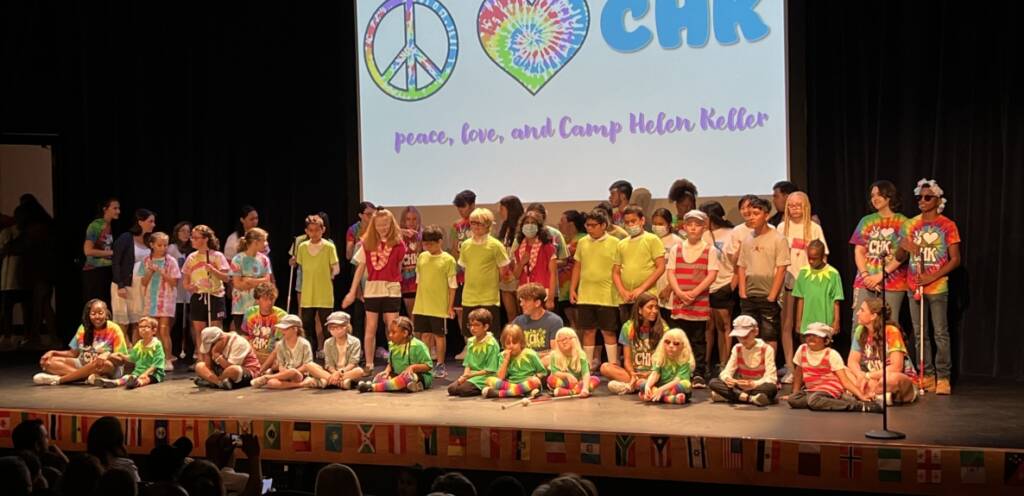 Group of campers on stage.