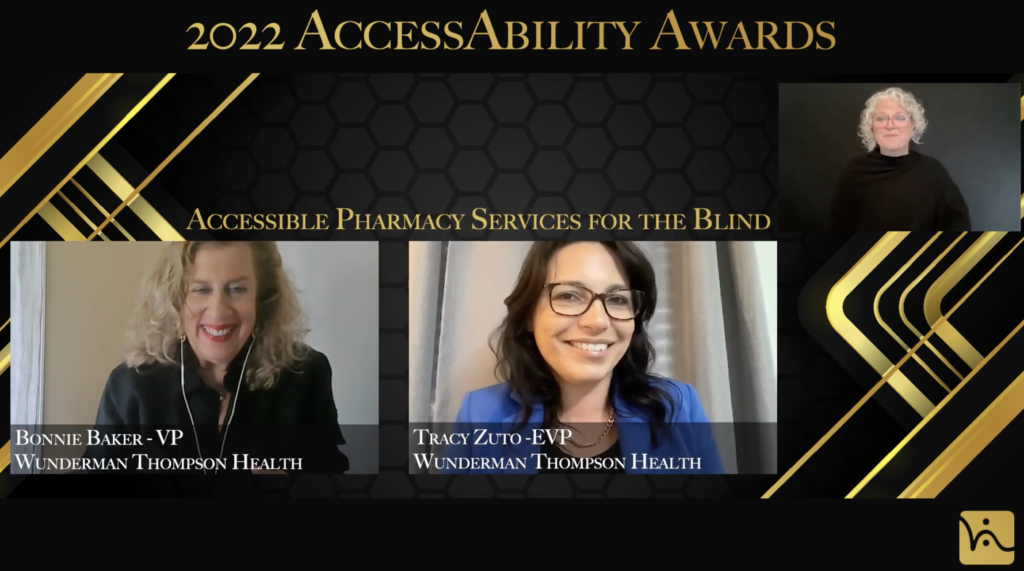 Two woman smiling into camera. Text on top of image says “2022 AccessAbility Awards”
