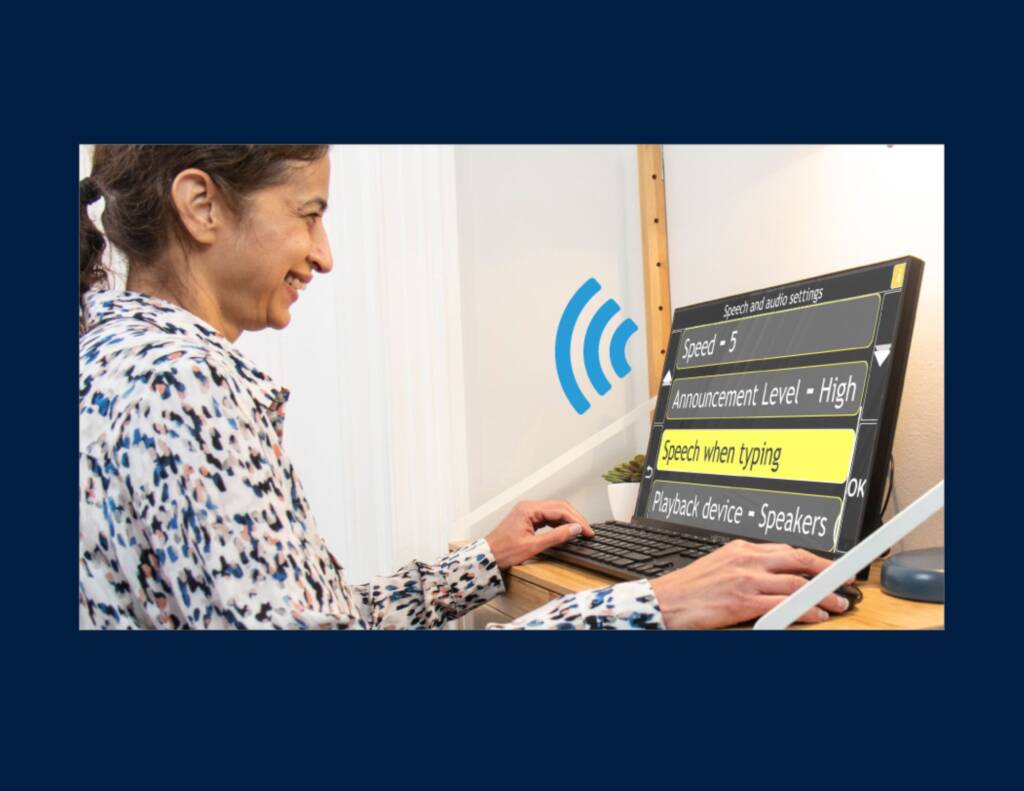 A woman on a laptop that shows speech and audio settings in large text on it.