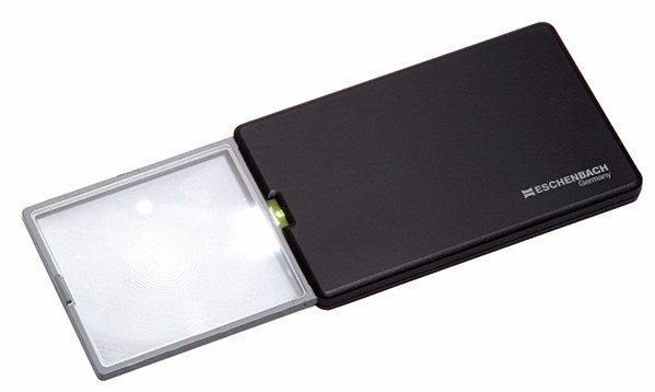 A black magnifier with a light on it