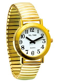 A gold wristwatch. The face of the watch is white with large black numbers on it and thick black hour and minute hands