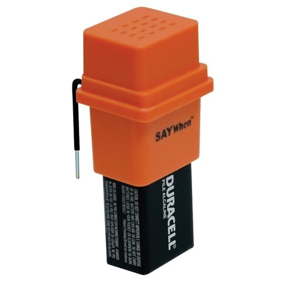 An orange device with the words SAY When on it. A large battery is sticking out of the bottom of the orange device
