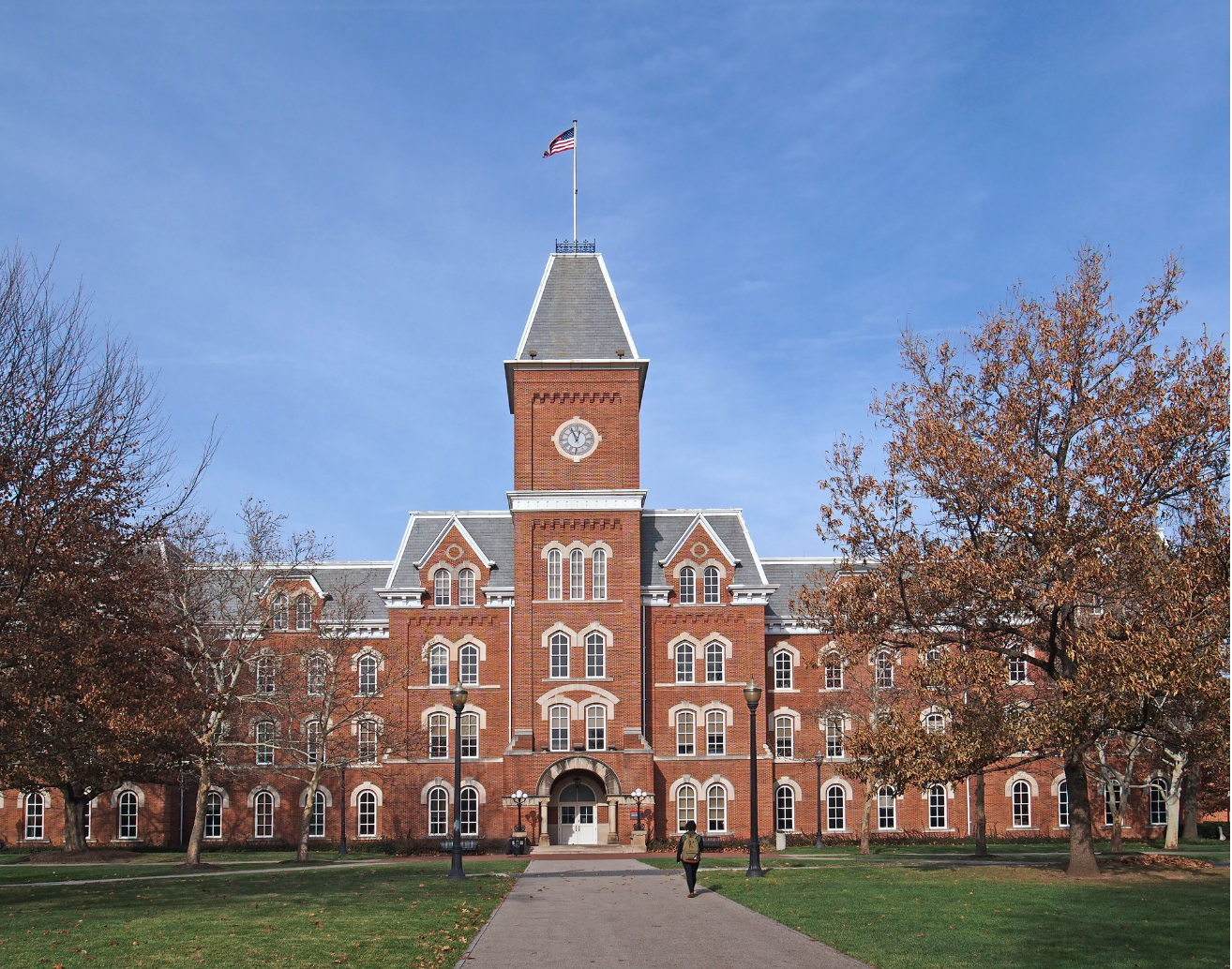 A red brick building on a college campus.