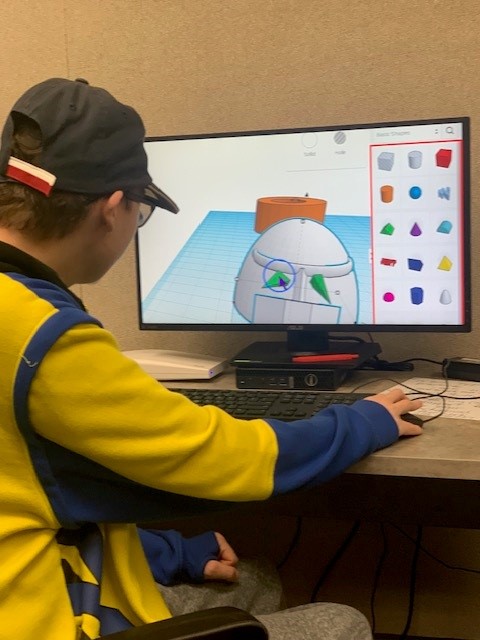 Participant using Tinkercad on a HKNC lab computer.