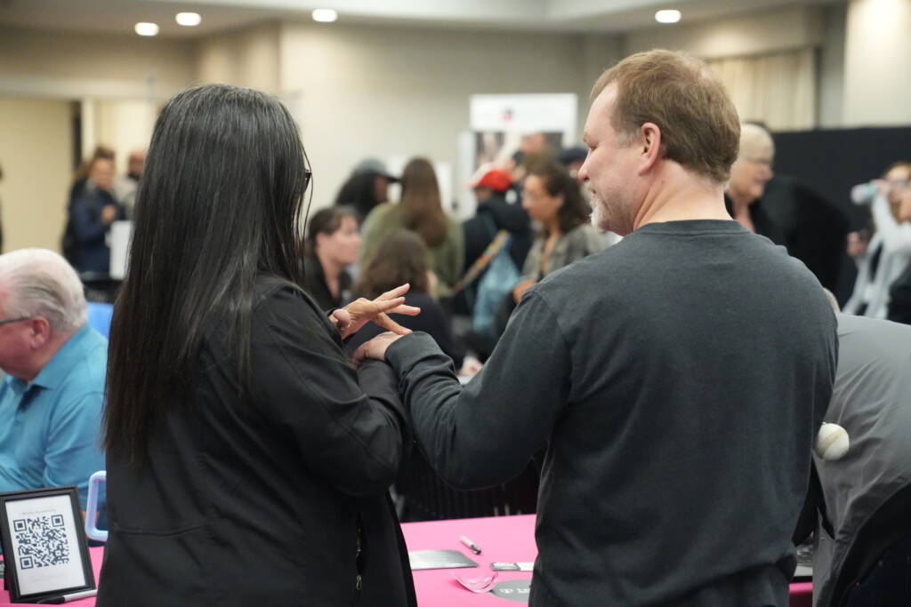 Regional Rep Marilyn provides environmental information through haptics to a attendee?