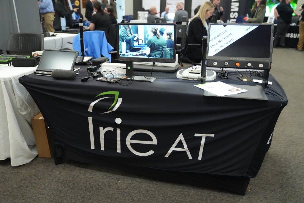 The Irie AT vendor table unmanned featuring several magnifying screens on display.