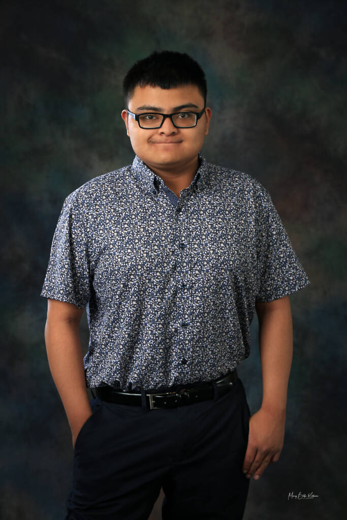 Headshot of Noah Richtmeyer-Weiner standing in professional attire. 