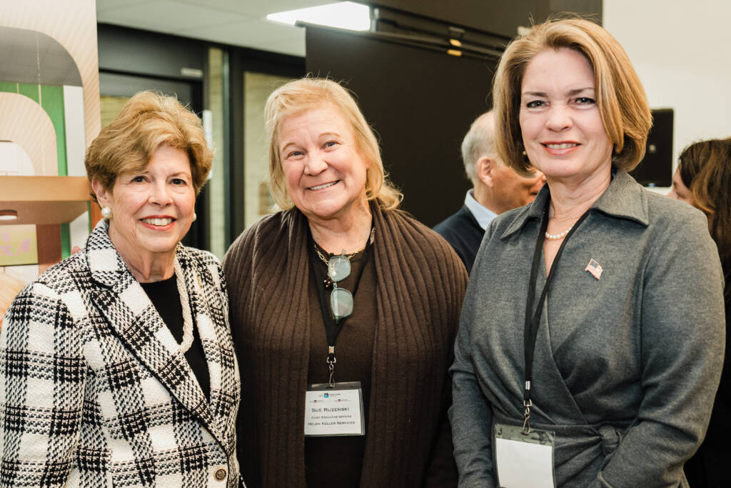 Sue Ruzenski stands between Mayor Nora Haagenson and Supervisor Jennifer DeSena .