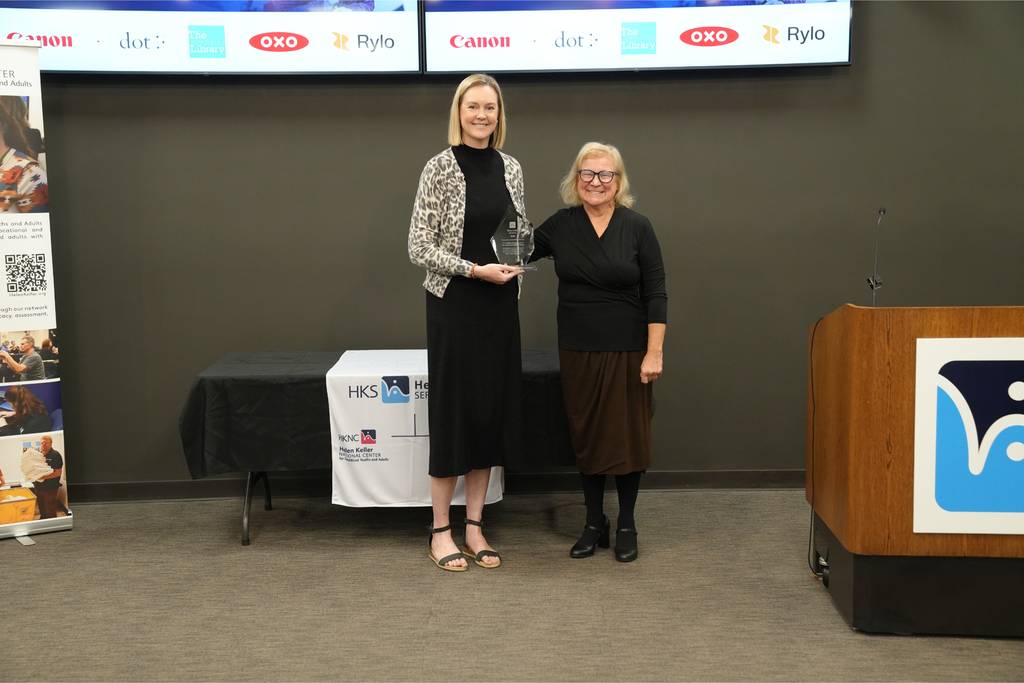 The Michigan Road Branch accepts its award with HKS CEO Sue Ruzenski.